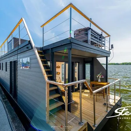 船上ホテル Hausboot Gluecksmomente Mit Dachterrasse In Am Ostseefjord Schlei シュレースヴィヒ